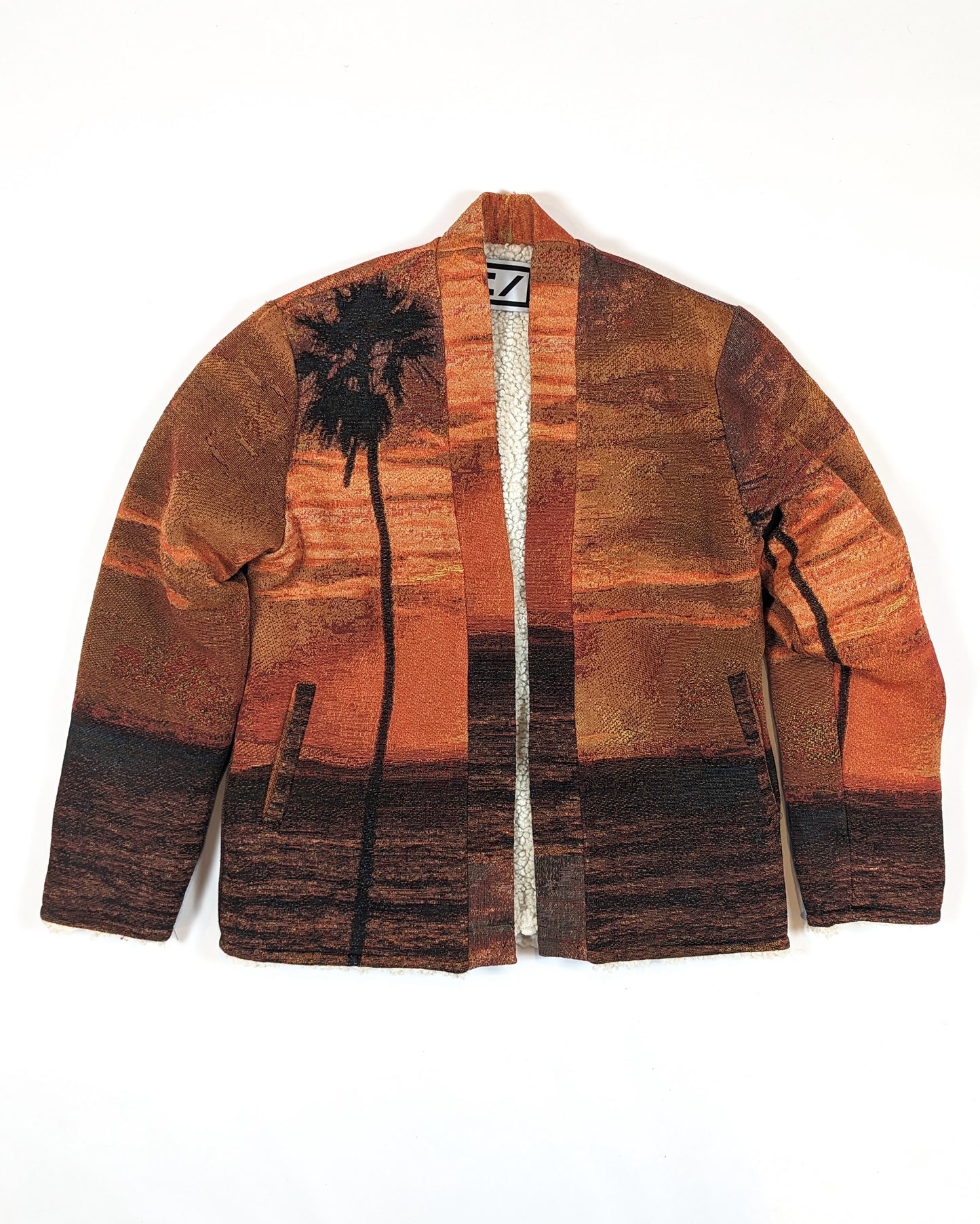 REVERSIBLE FLEECE TAPESTRY CARDIGAN IN SUNSET