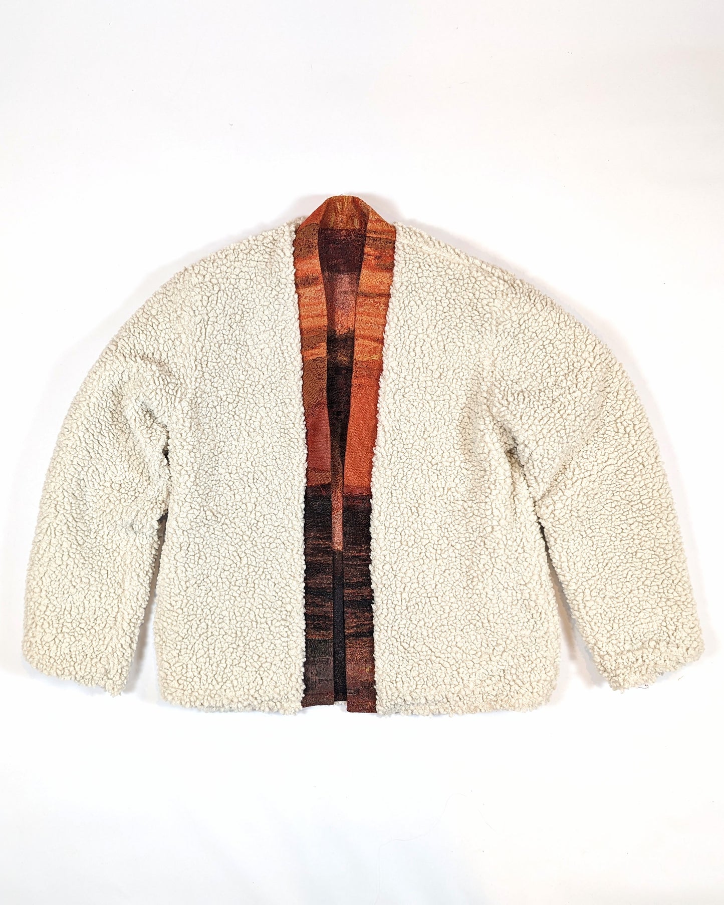 REVERSIBLE FLEECE TAPESTRY CARDIGAN IN SUNSET